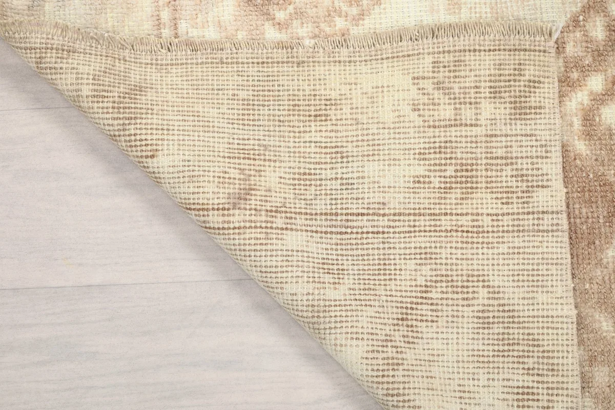 Close-up of the reverse side of the rug, detailing the knot structure and weave