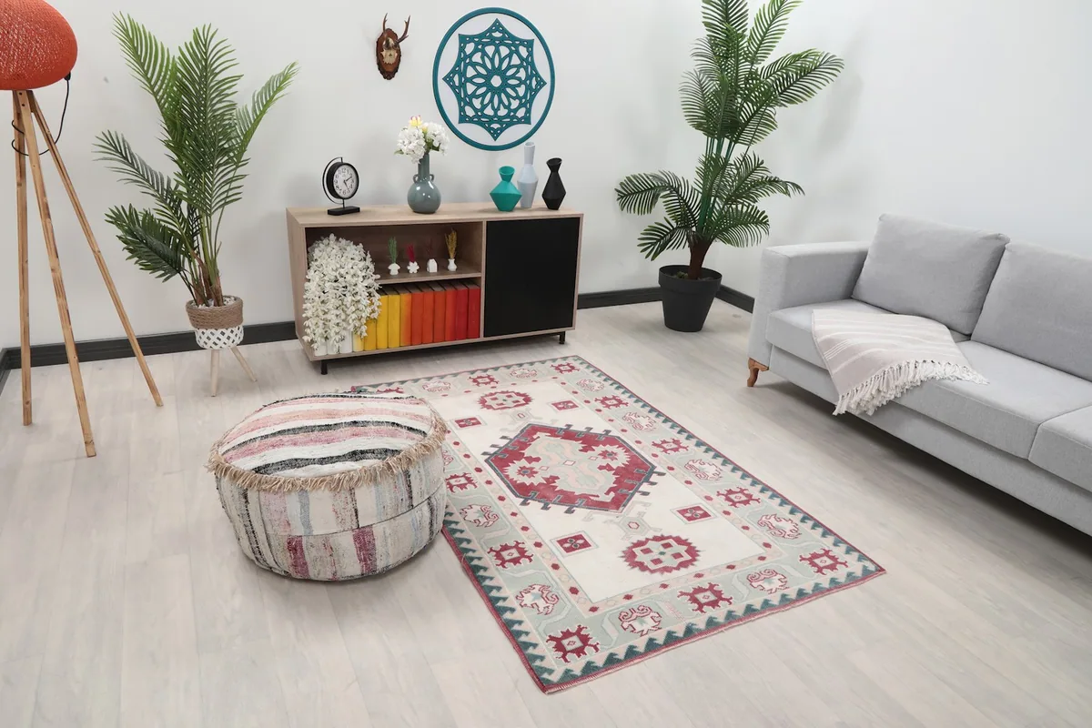 Overhead view of the rug in a living room, showing its placement relative to furniture
