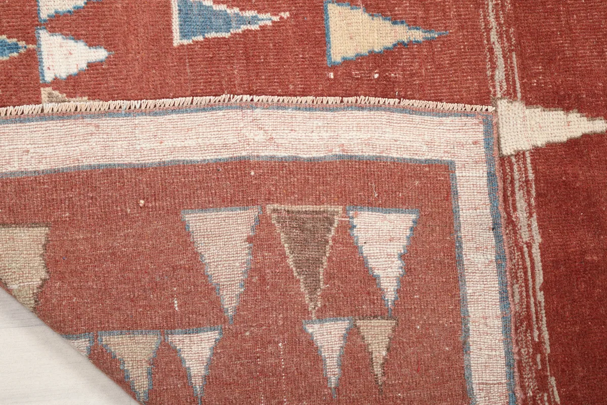 Close-up detail of the reverse side of the Rust Geometric Anatolian Rug, revealing its craftsmanship.