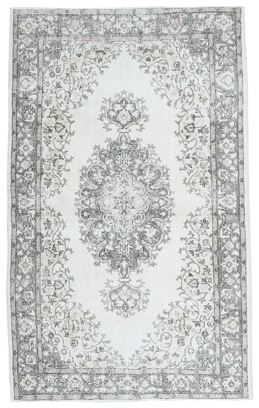 Full top view of the ivory and gray vintage Anatolian rug