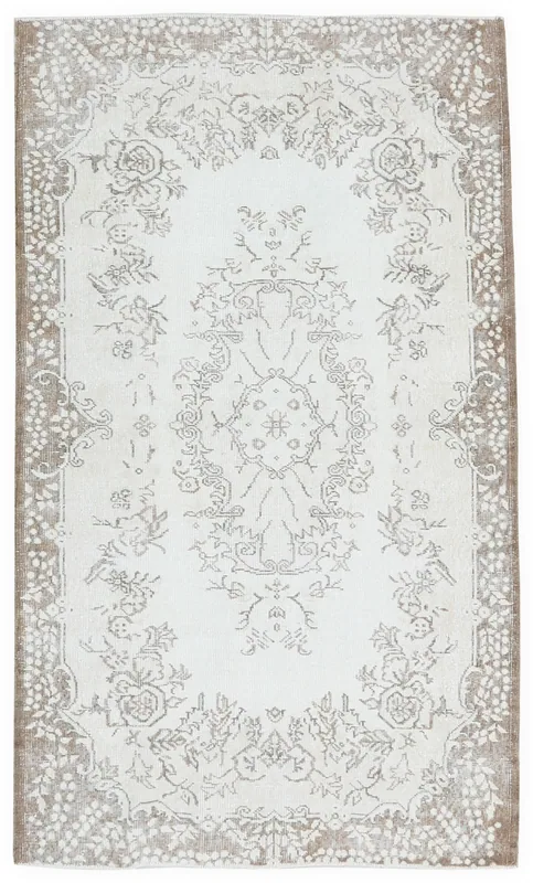 Full top view of the ivory and brown vintage Anatolian area rug