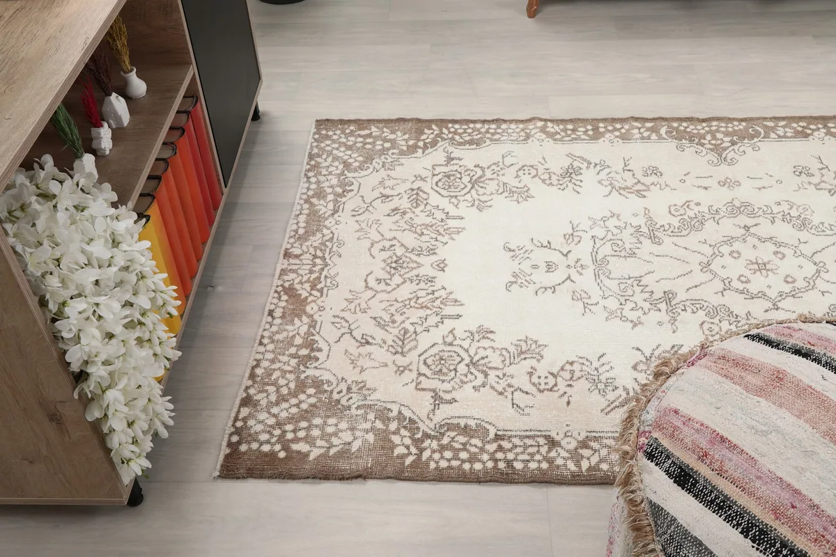 Angled view of the rug on the floor, showcasing its full design