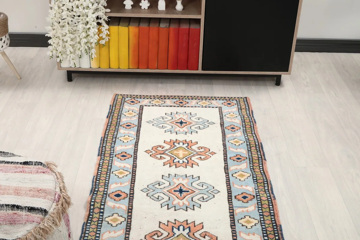 View of the runner rug from above, showcasing its design in a room setting
