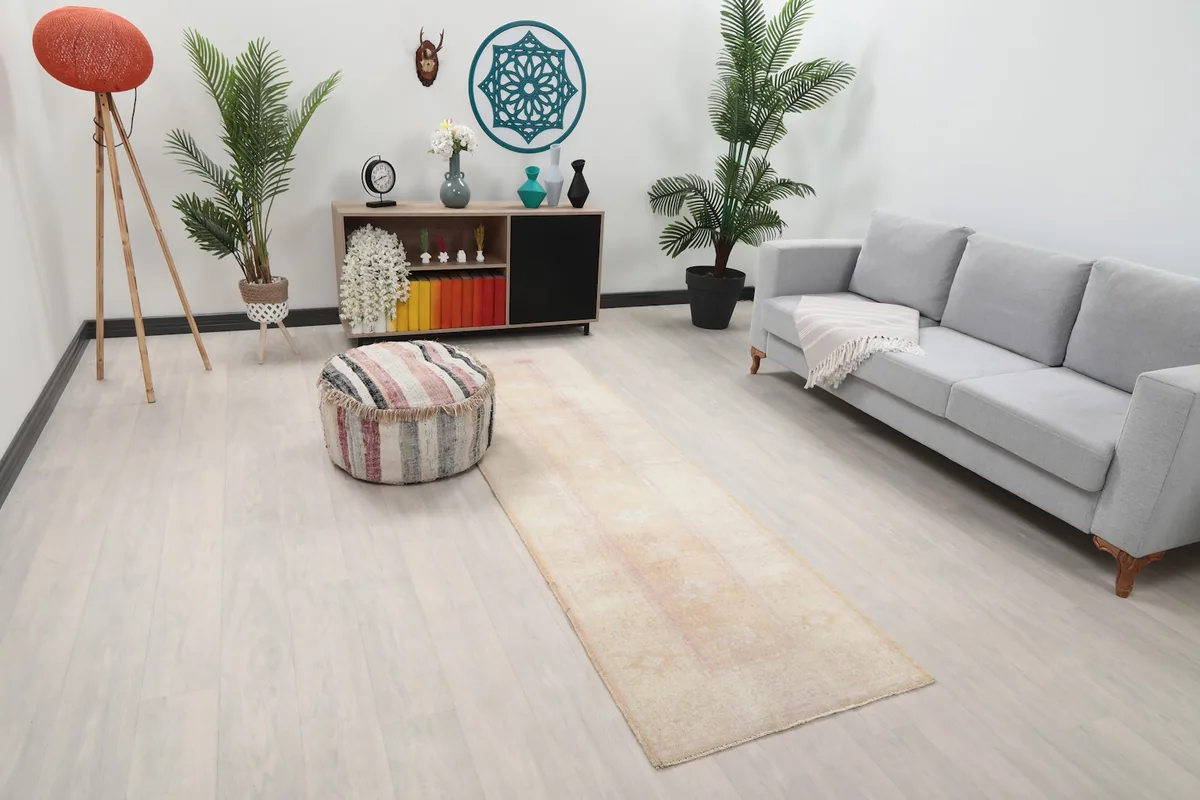 Runner rug placed in a room, showing its length relative to furniture
