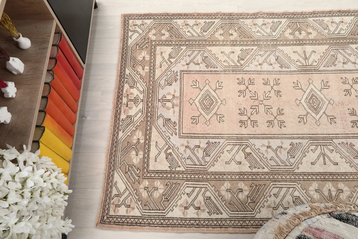 Angled view from above, capturing the rug's patterns and slight color variations