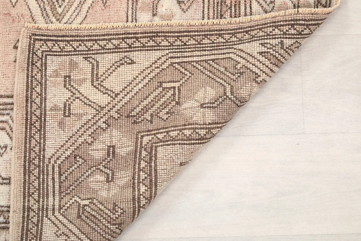 Another folded corner, showing the rug's construction and flexible nature