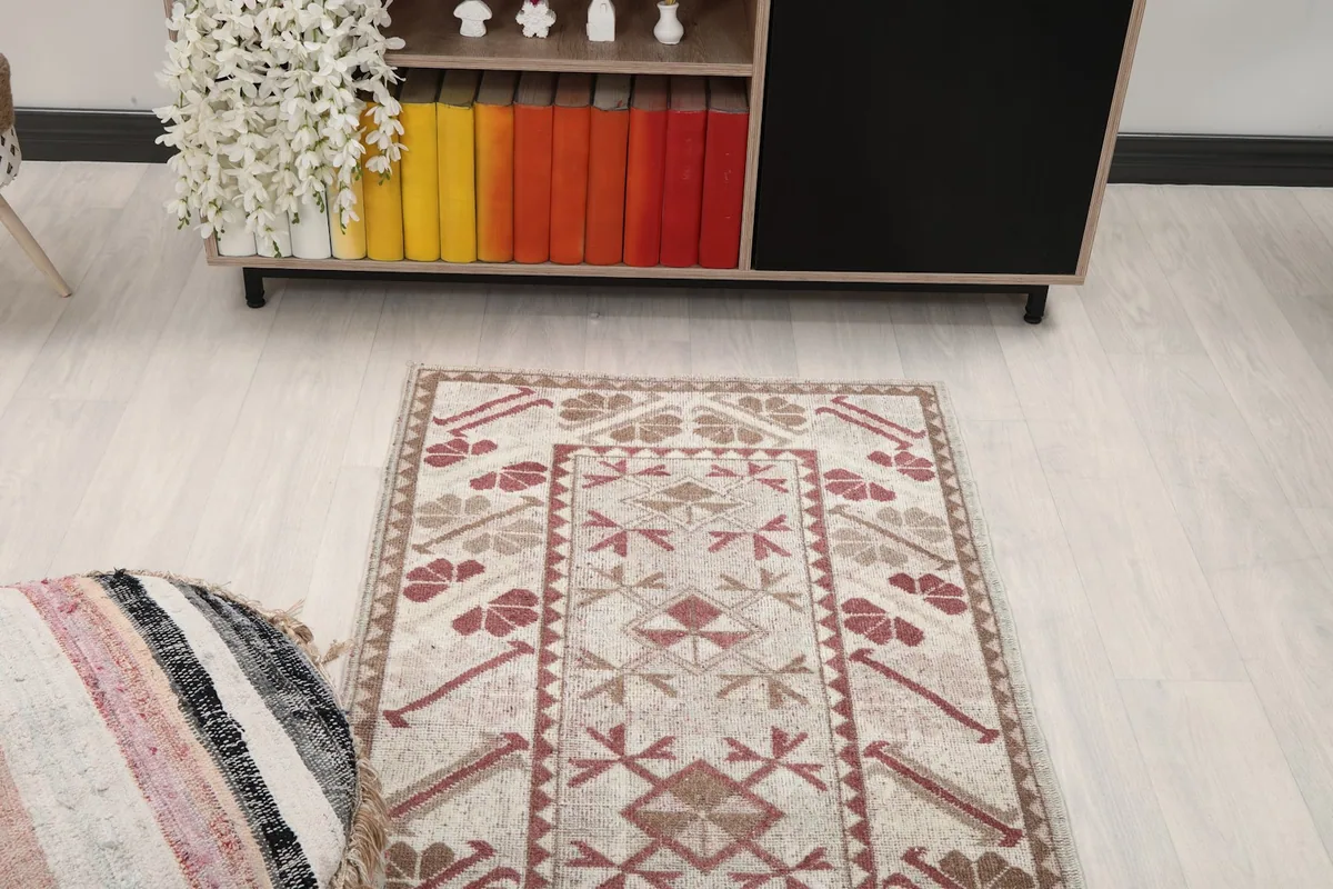 Overhead view of the runner rug in a room, showing its placement near furniture