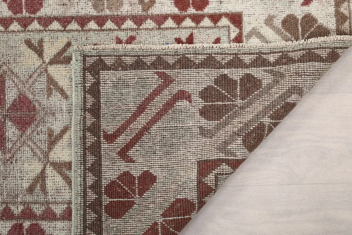 Another folded view of the rug, illustrating the construction and material