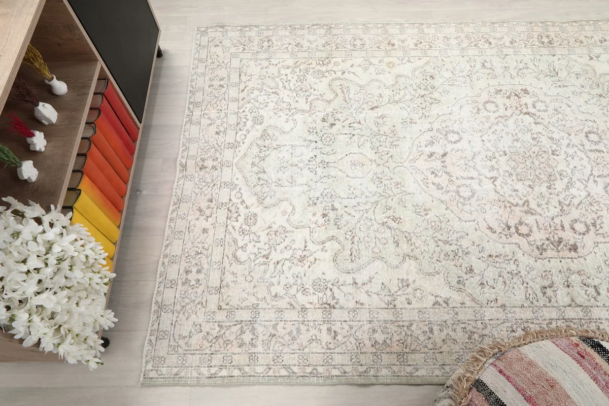 Wide angle view from above, showing the rug's placement relative to furniture in the room.