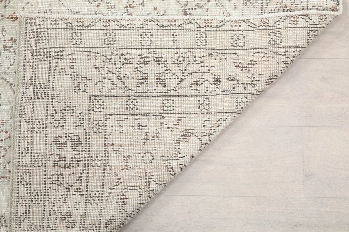 Close-up of the back of the rug, showing the consistent knotting and craftsmanship.