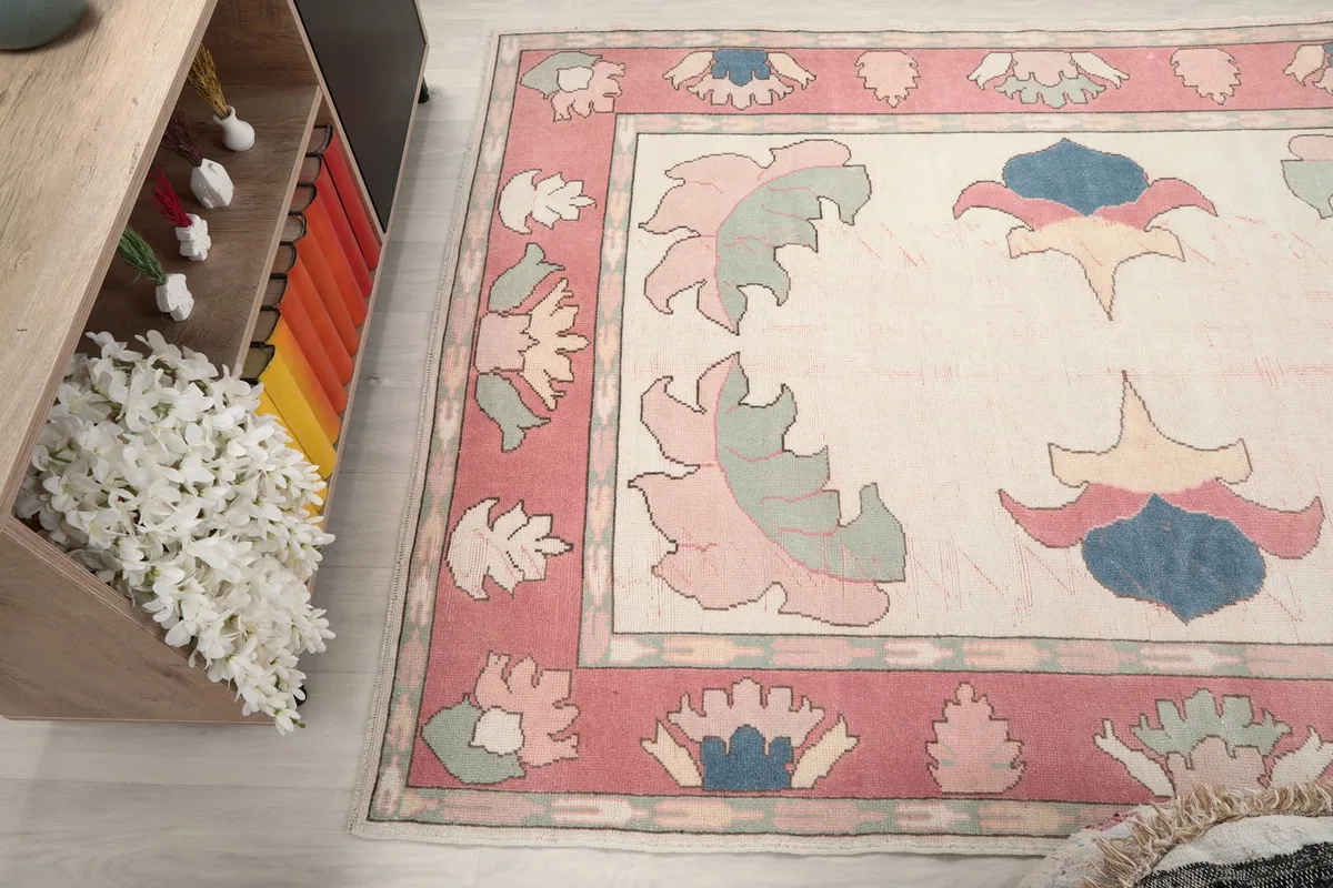 Angled shot of the rug's design and colors from a different perspective in the room