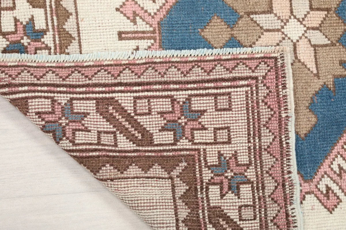 Another view of the rug's reverse side, showing the tight knotting and craftsmanship