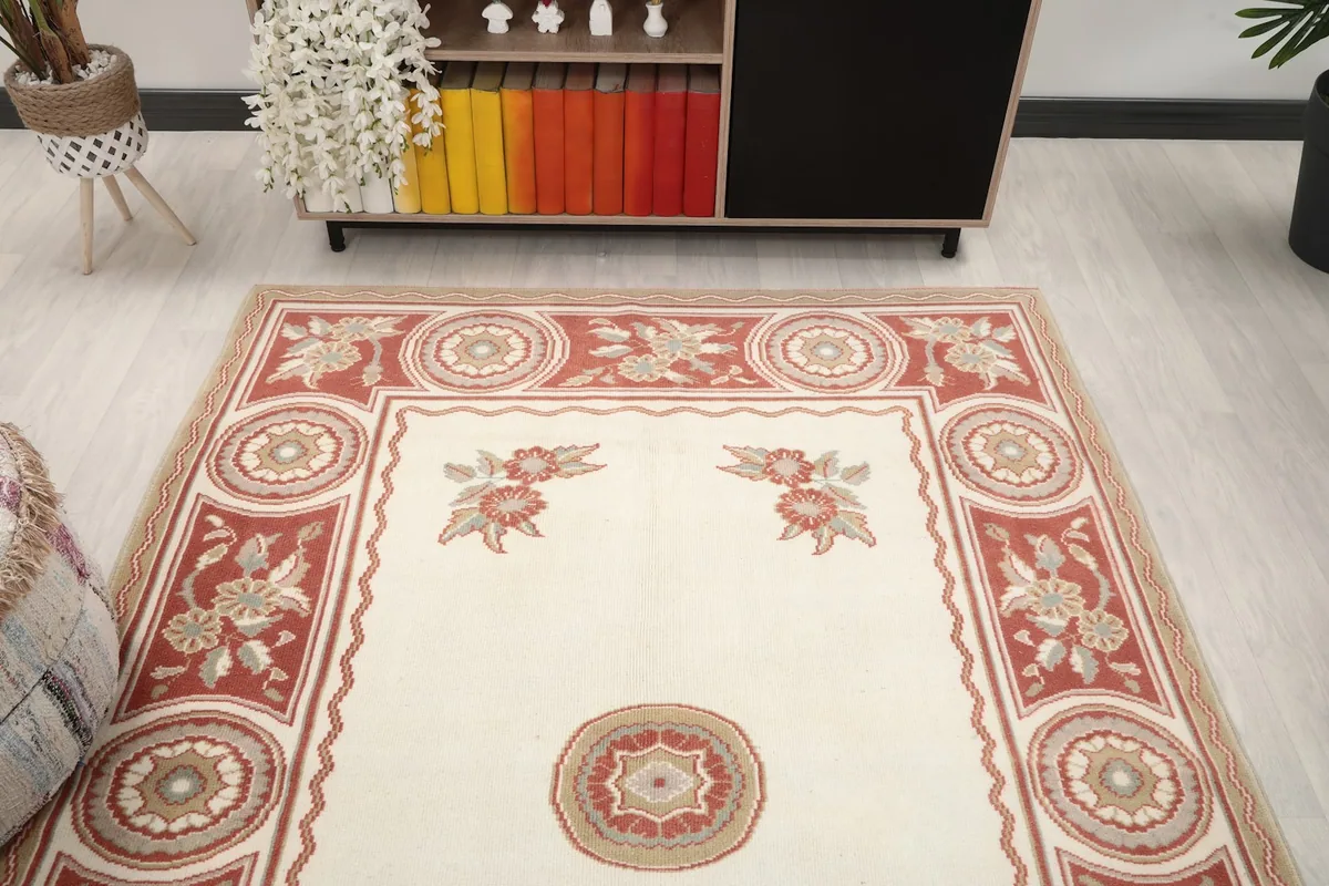 Frontal view of the rug in a room, showing its placement relative to furniture