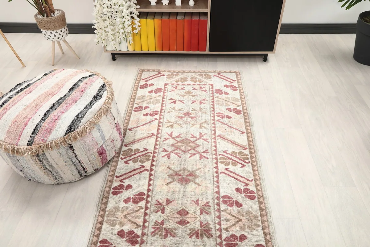 Overhead angle of the runner rug in a room, showing its length and design