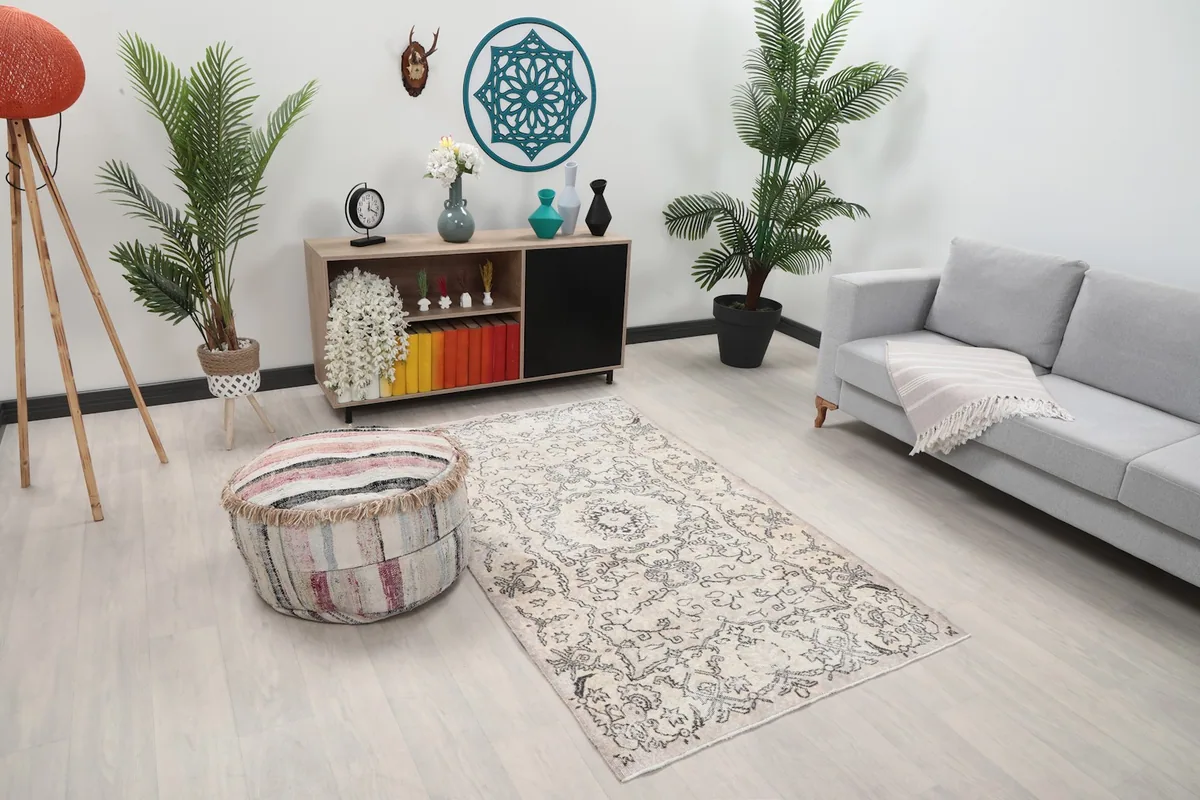 Overhead view of the ivory and charcoal rug placed in a modern living space