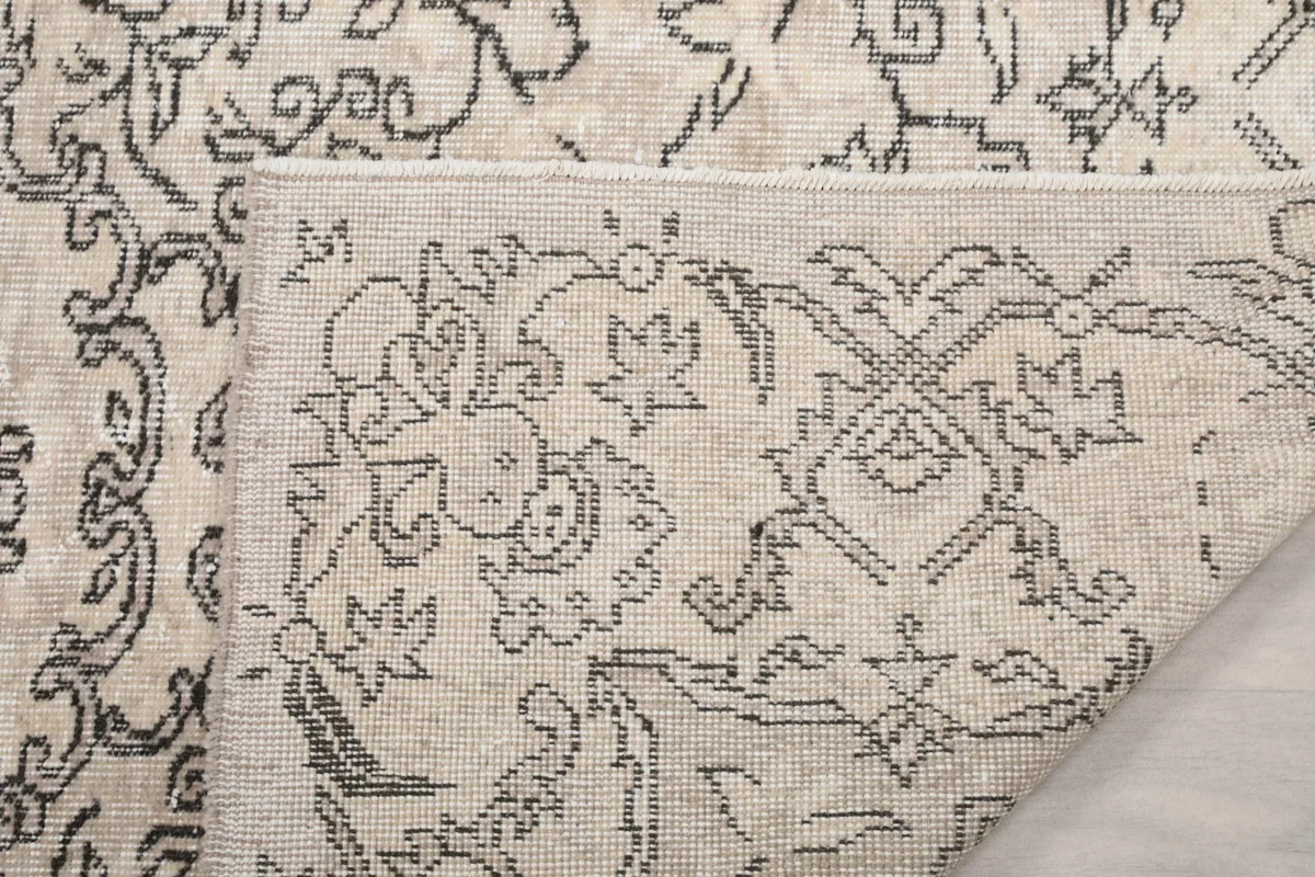 Detail of the back of the rug, revealing the hand-knotted construction