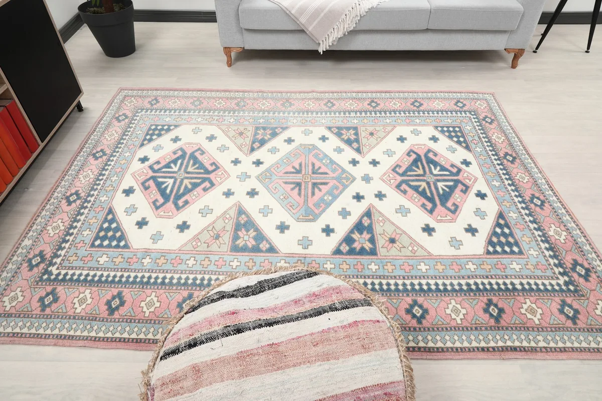 Overhead shot of the rug in a room, showing the full design and colors from a higher perspective
