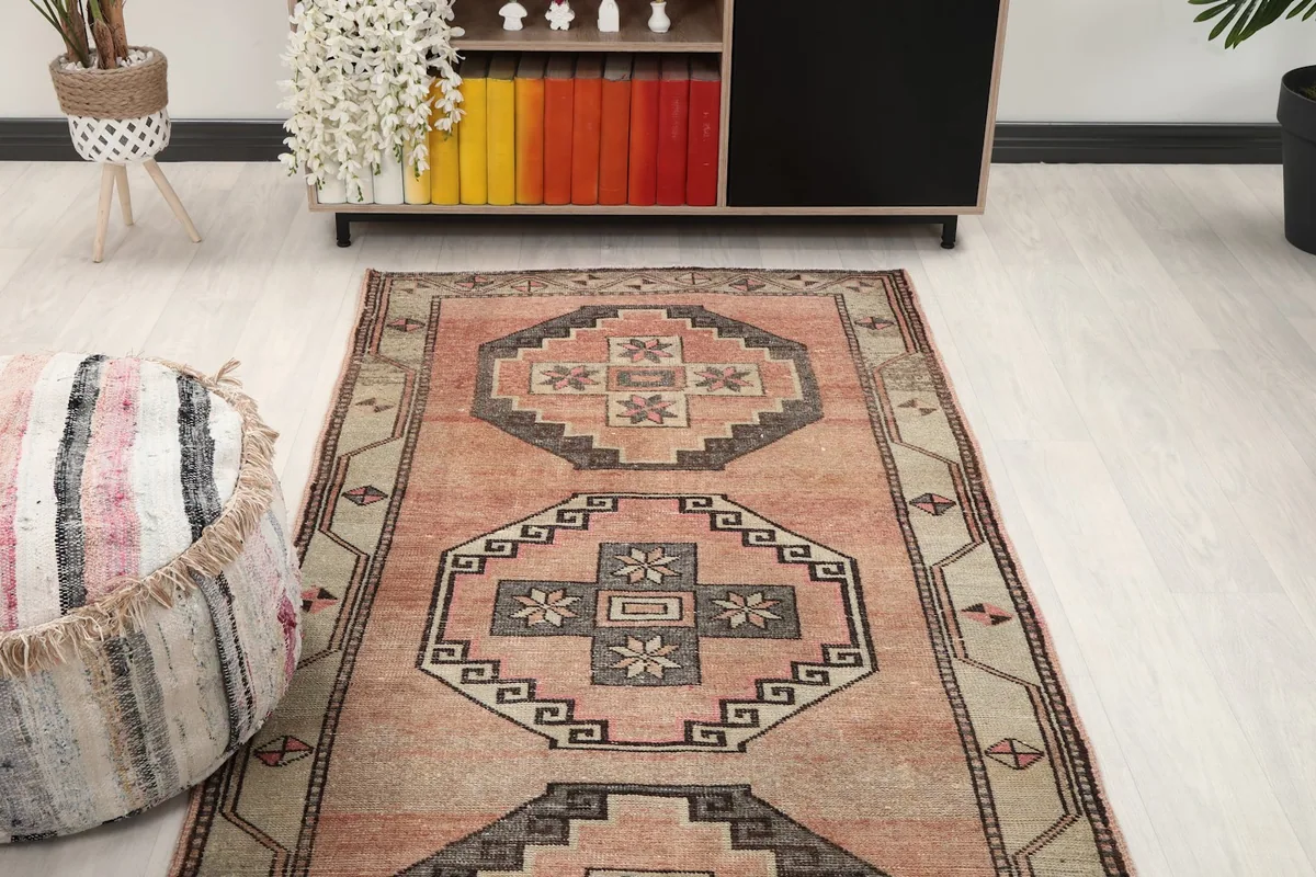 Overhead view of the rose runner rug in a room, highlighting its placement and length.
