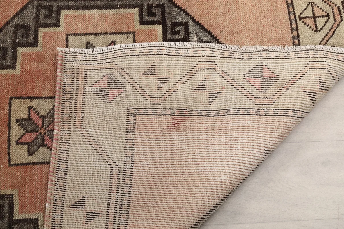 Close-up of the back of the rug, showing the tight knotting and craftsmanship.