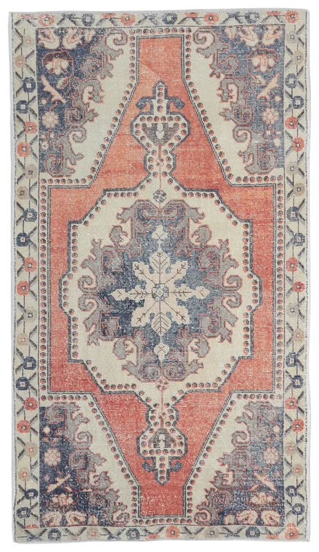 Top view of a 4'8" x 7'3" vintage rust and navy Anatolian rug