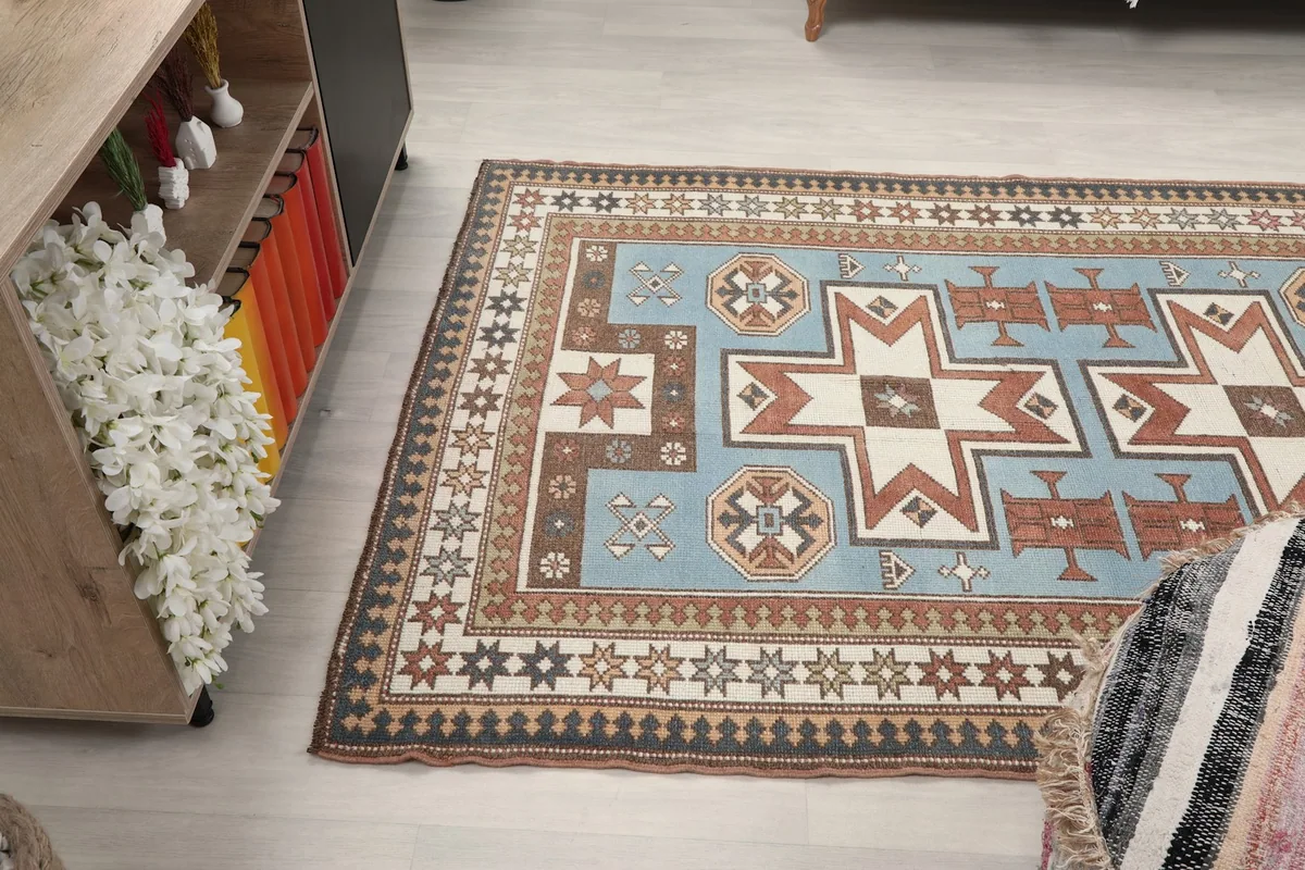 Side view of the rug in a room, capturing its overall presence and color palette