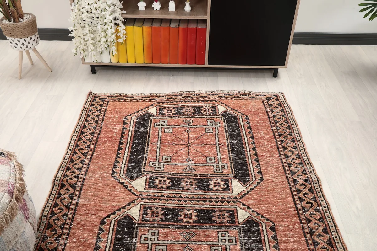 Overhead angle of the runner rug, focusing on the repeating geometric panel design.