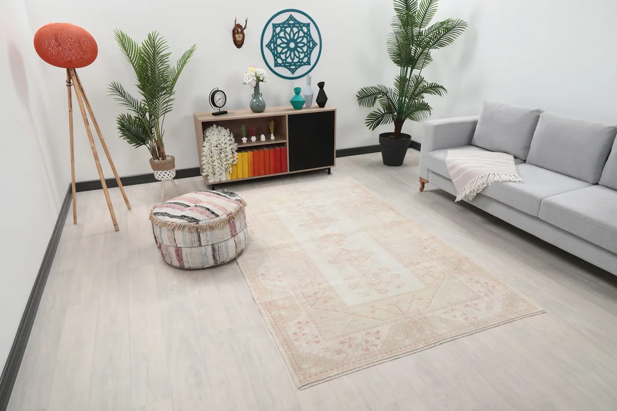Angled view of the vintage Anatolian rug within a contemporary living space