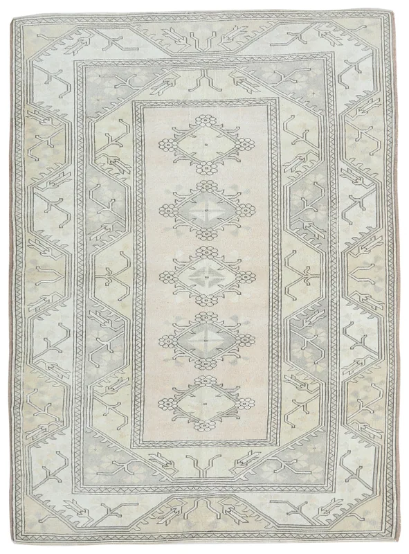 Full top view of the beige and gray vintage Anatolian area rug