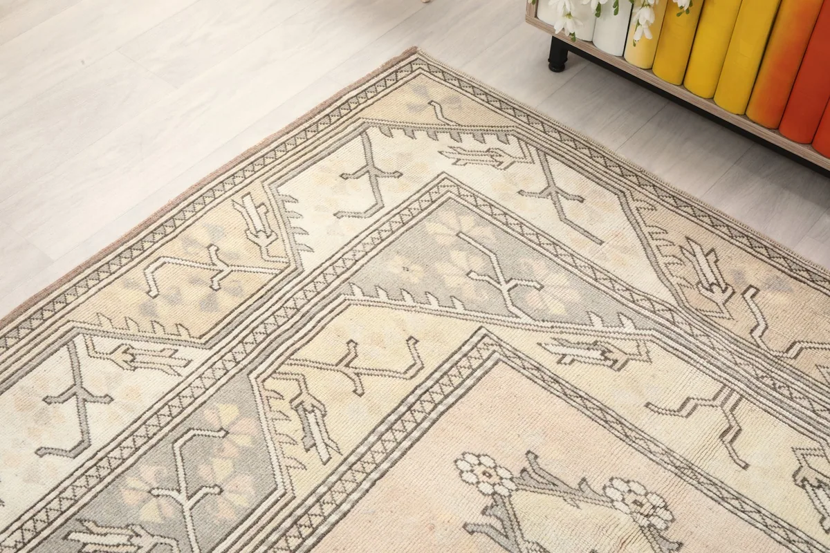 Corner detail of the rug showing the intricate border work