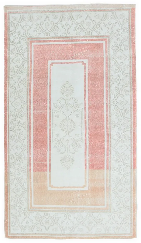 Full overhead view of the rose and ivory vintage Anatolian rug on a white background.