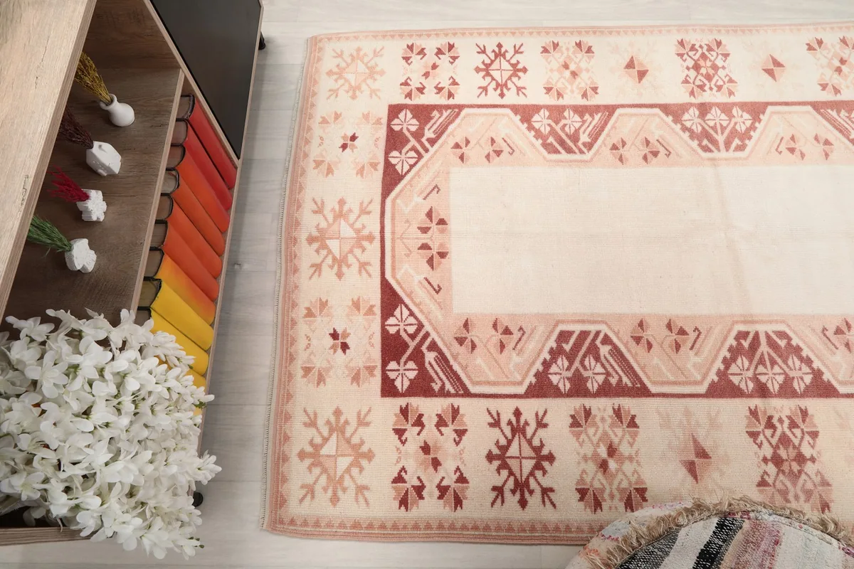Angled view of the rug from above, showing the full pattern and colors