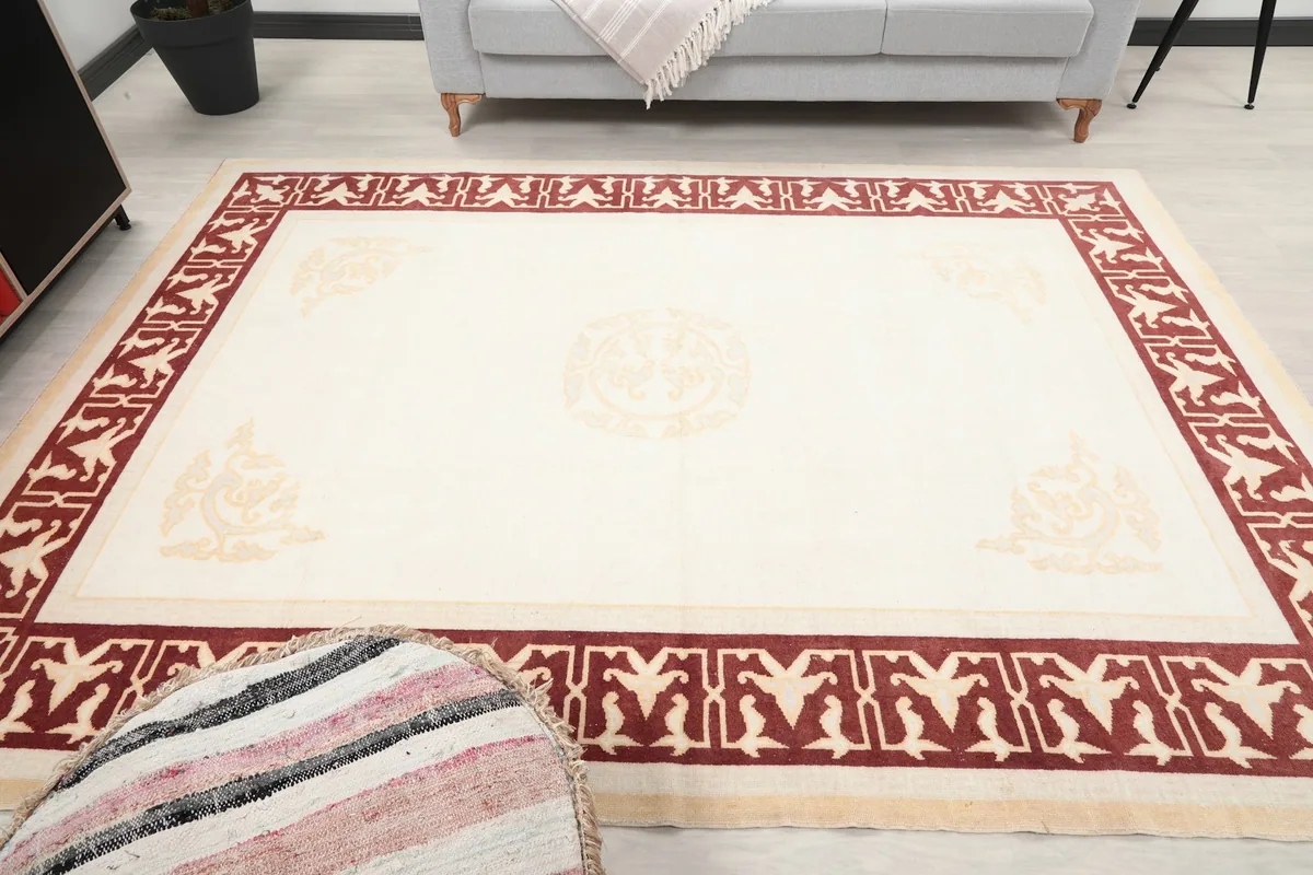 Wide shot of the rug centered in a room, offering a sense of its full size