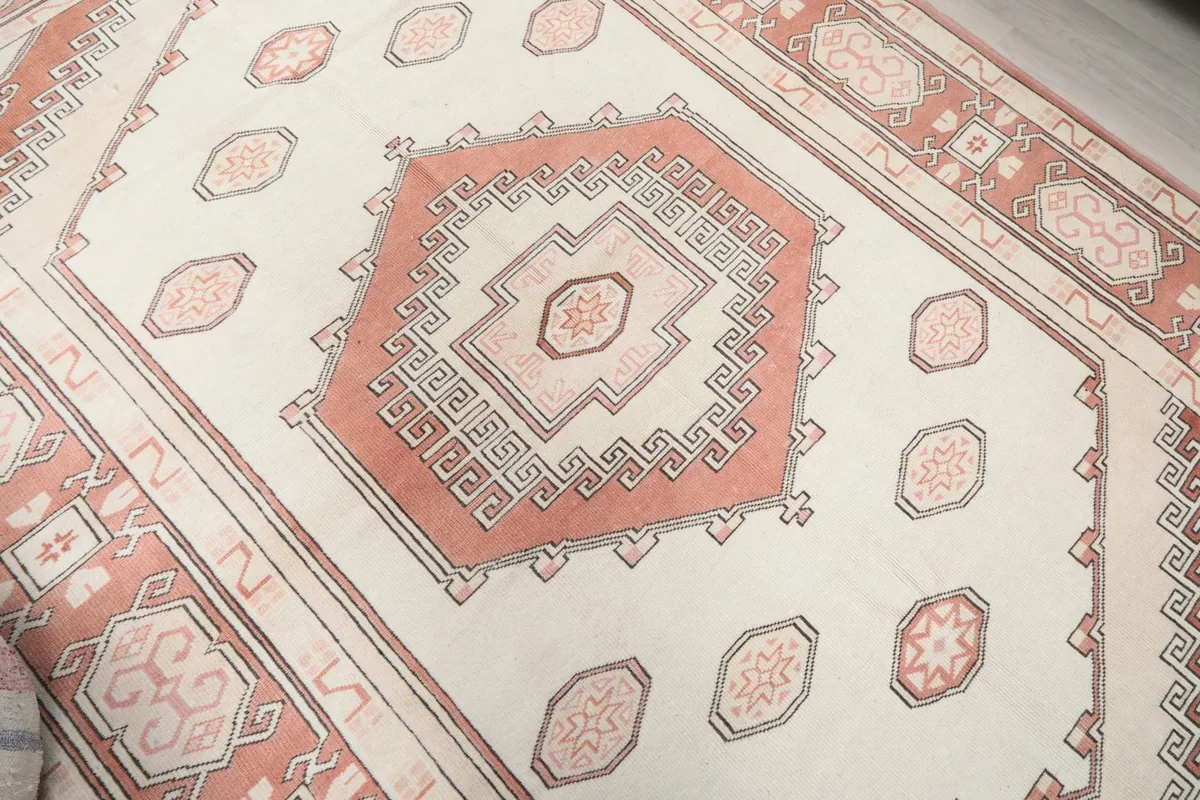 Close-up of the central geometric medallion and field patterns