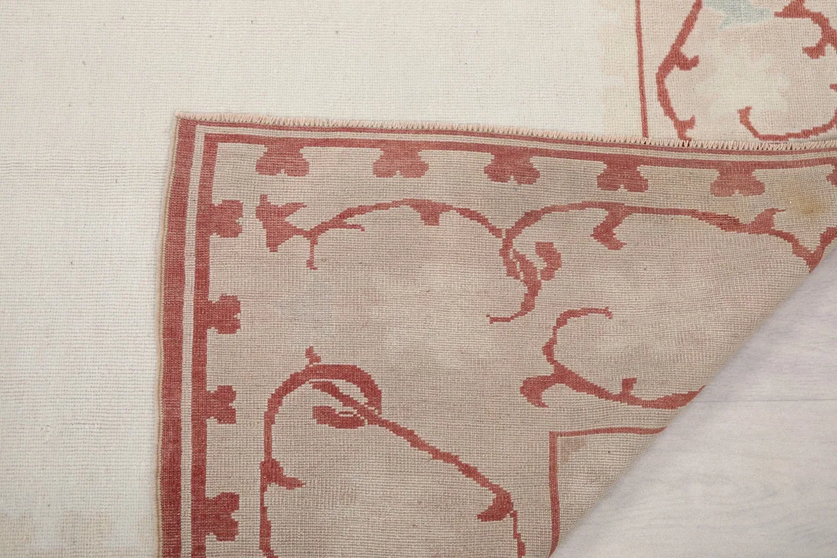 Underside view of the rug, showing the cotton foundation and hand-knotted craftsmanship.