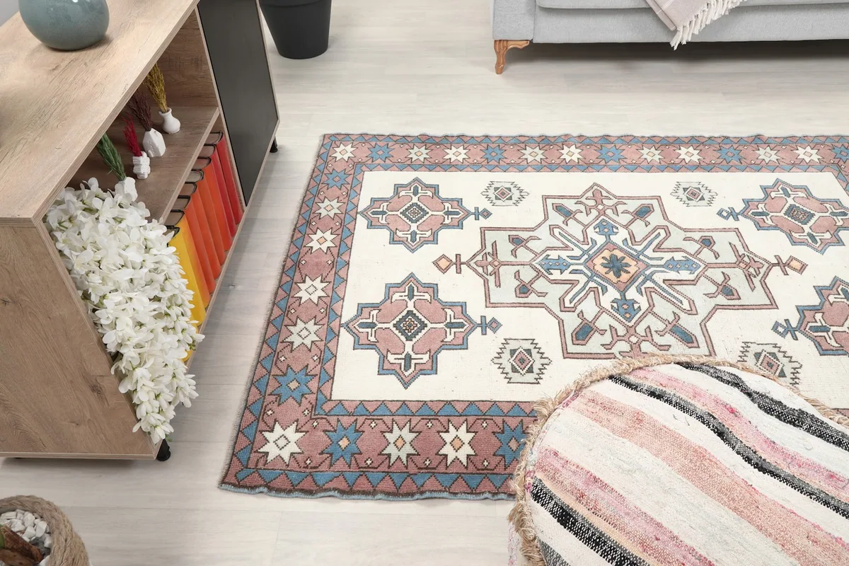 Rug placed in a room, showing its scale relative to furniture