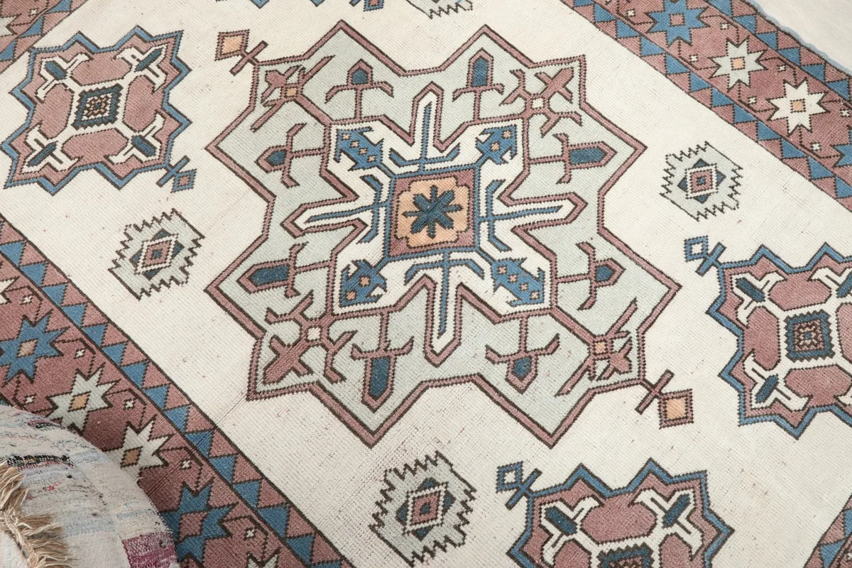 Close-up of the central geometric medallion and surrounding motifs