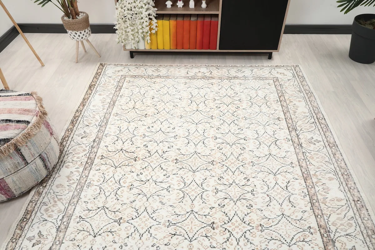 Overhead view of the ivory rug in a room, showing its placement relative to furniture
