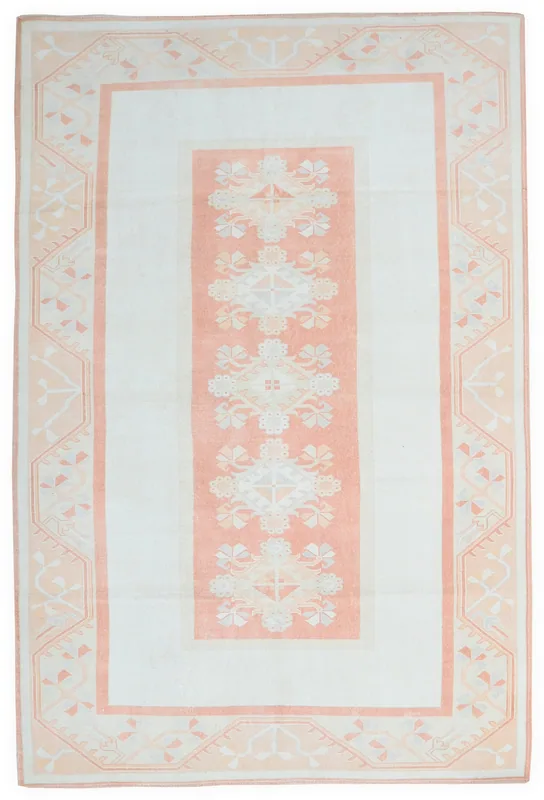 Full overhead view of the 6x10 vintage ivory and rose Anatolian rug