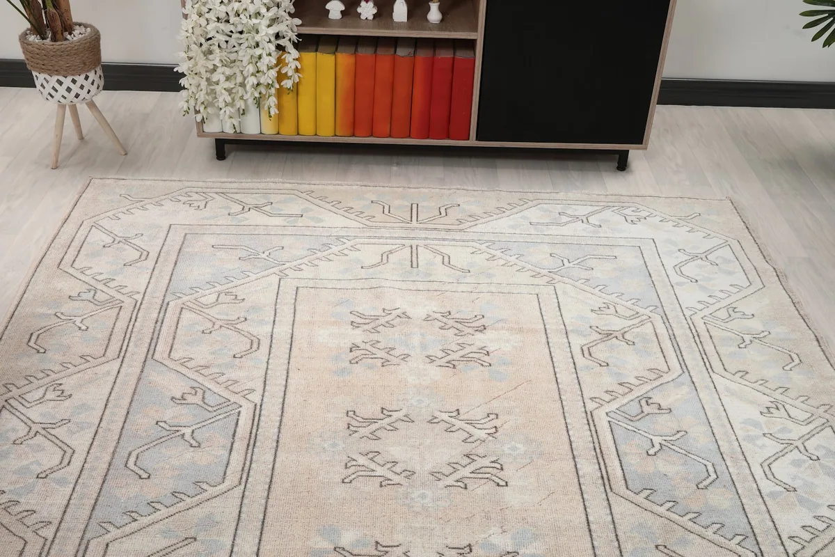 Overhead angle shot highlighting the rug's central design and border