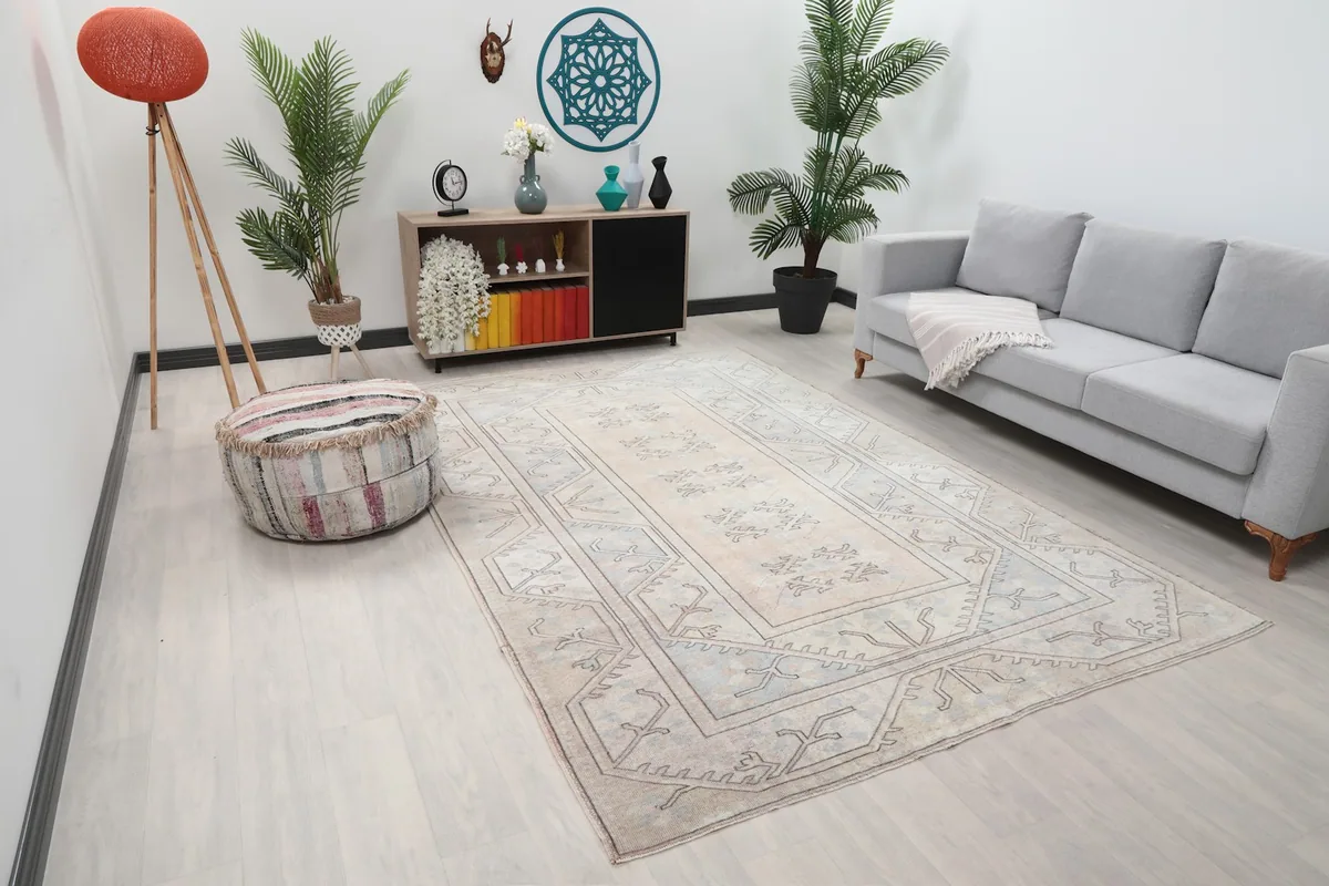 Angle view of the Anatolian rug in a living room, showing its full size and colors