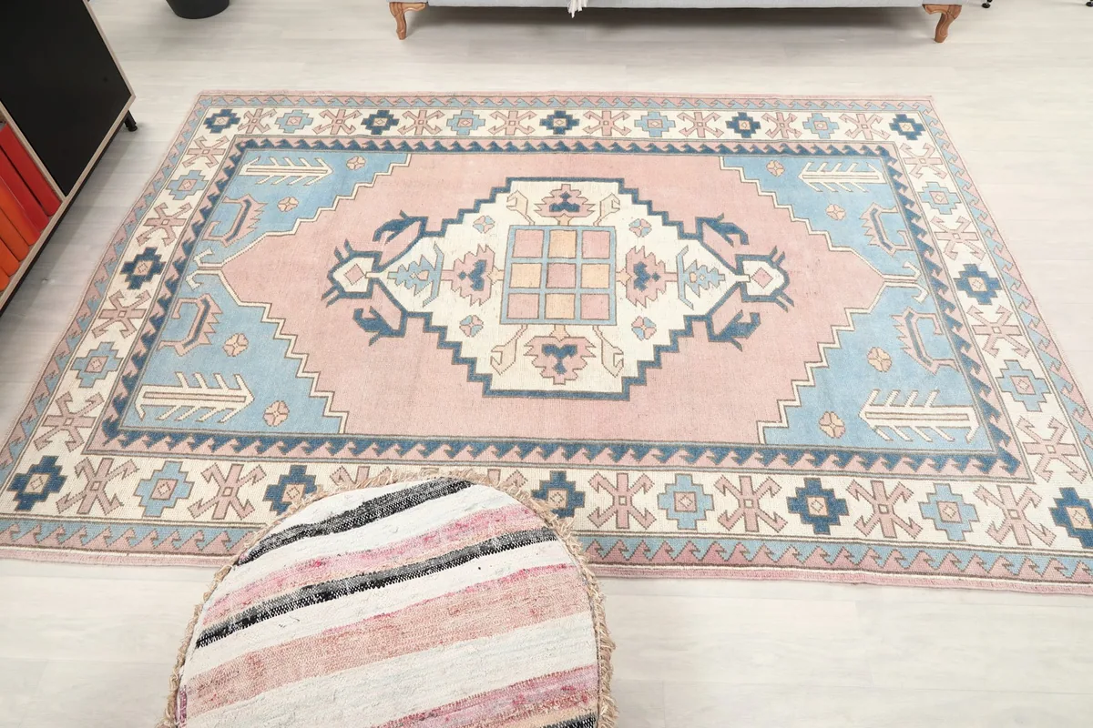 Full room view with the rug as the centerpiece, showing its medium size in the space