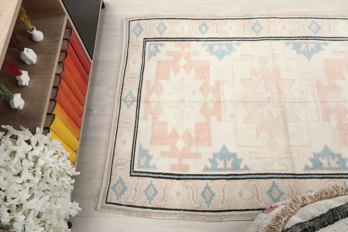 Angled overhead view of the rug, capturing its overall design and colors.