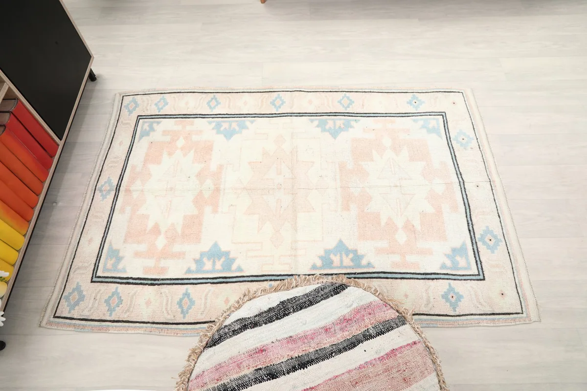 Full overhead view of the rug in a room setting.