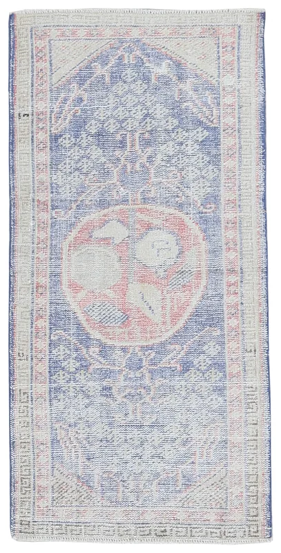 Top view of the 2'4" x 4'3" blue and rose vintage Anatolian rug with central medallion.