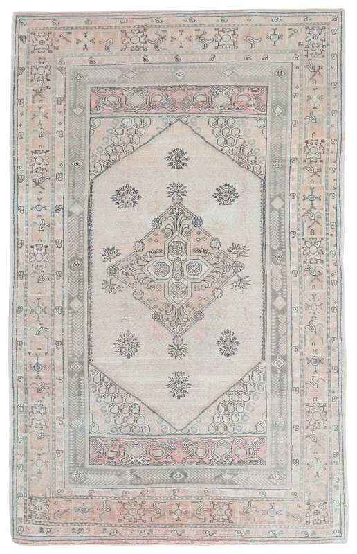 Full top view of the beige, rose, and gray hand-knotted vintage Anatolian area rug