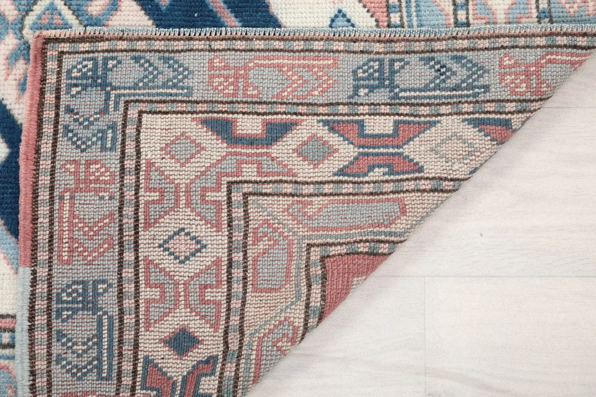 Another view of the back of the rug, showing the tight knotting and craftsmanship.