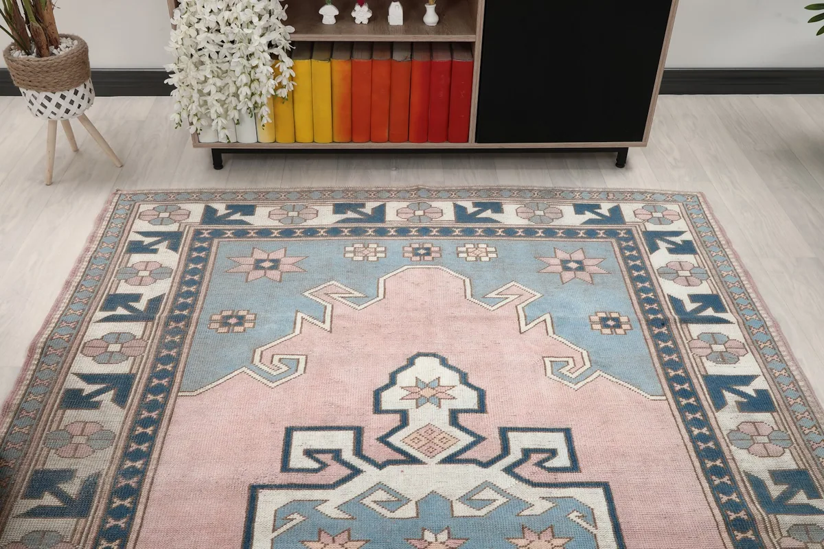 Overhead view of the rug in a room, showing its full design and placement