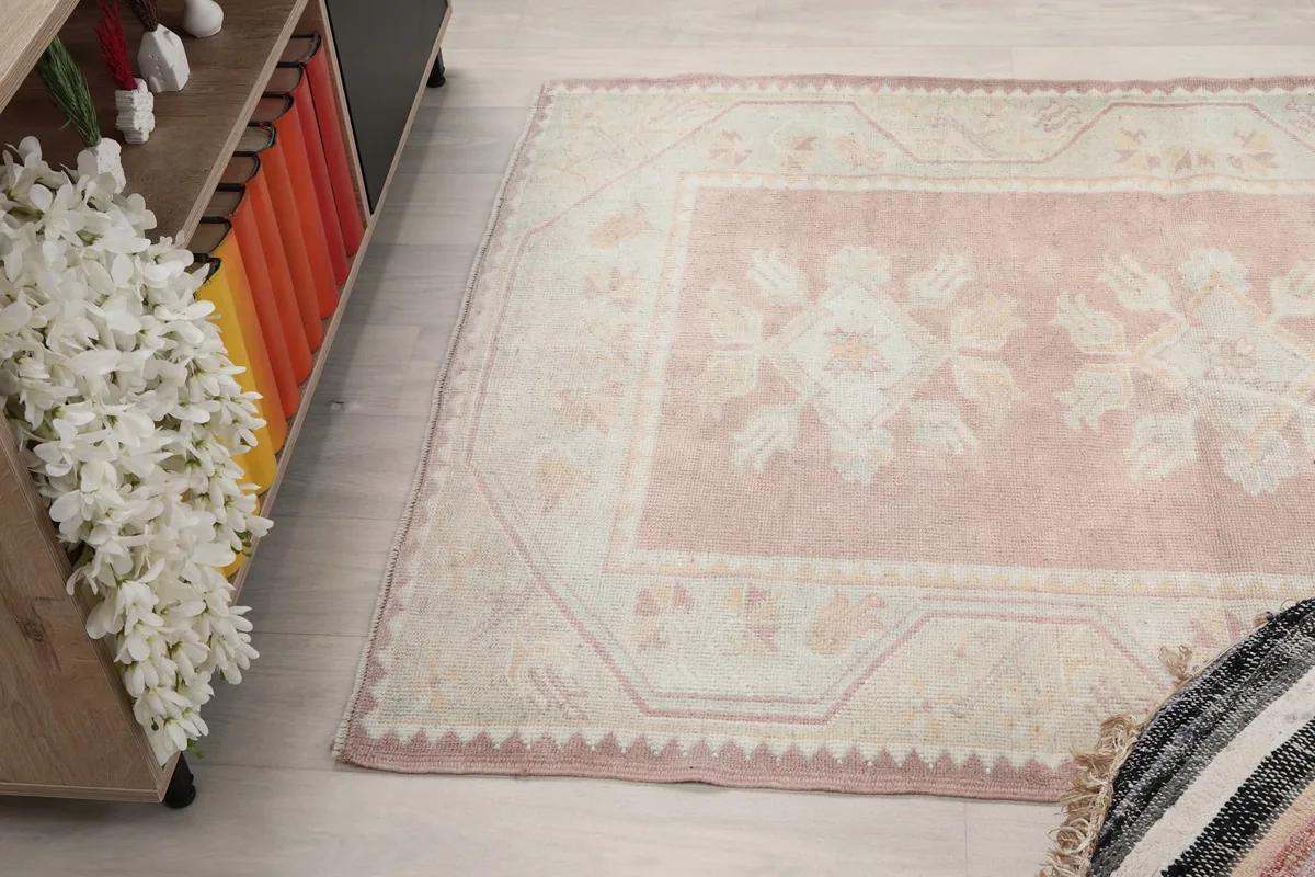 Angled view of the rug in a room, from a different perspective, showing its proportions