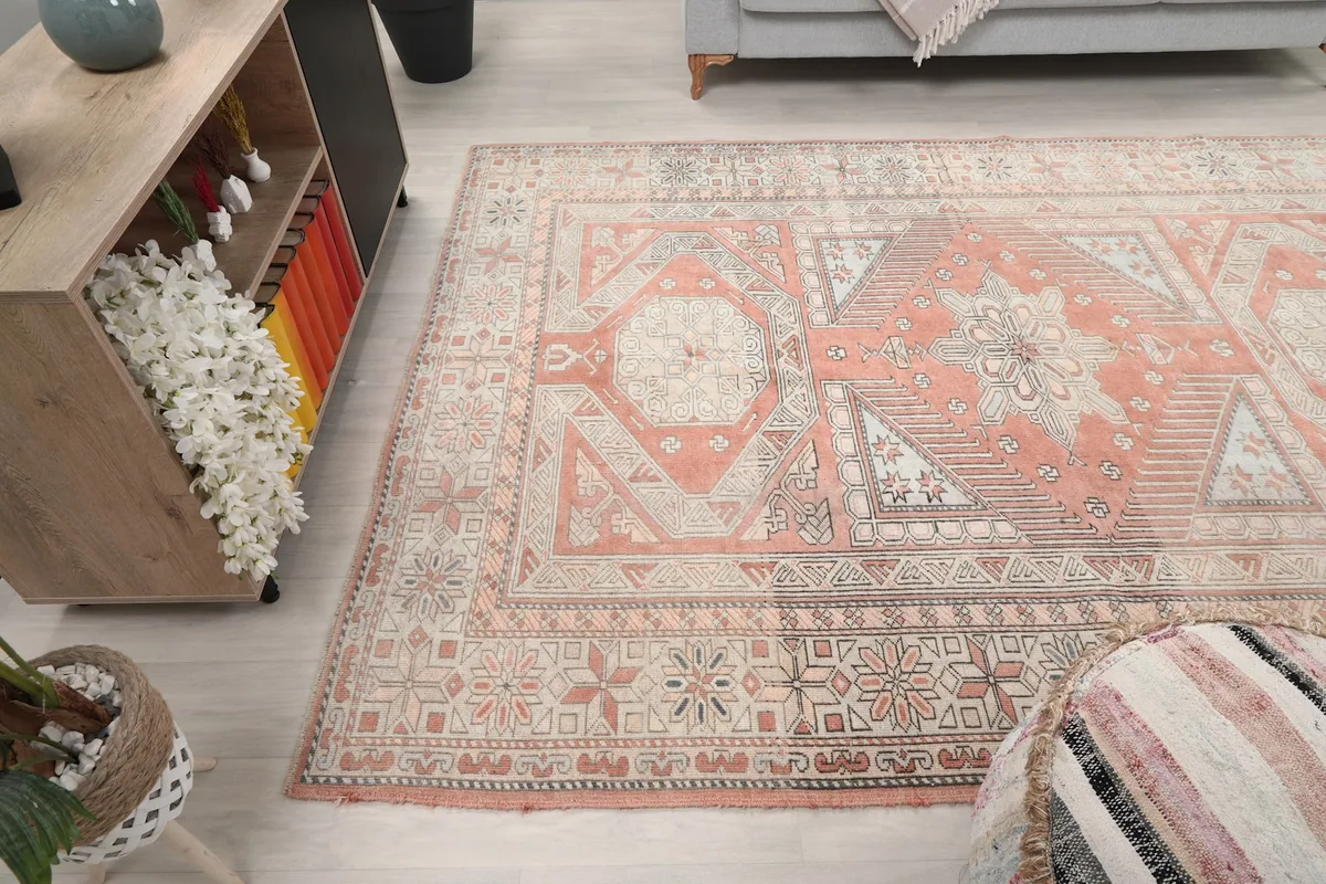 Overhead view of the rug in a living room, showing its placement relative to furniture