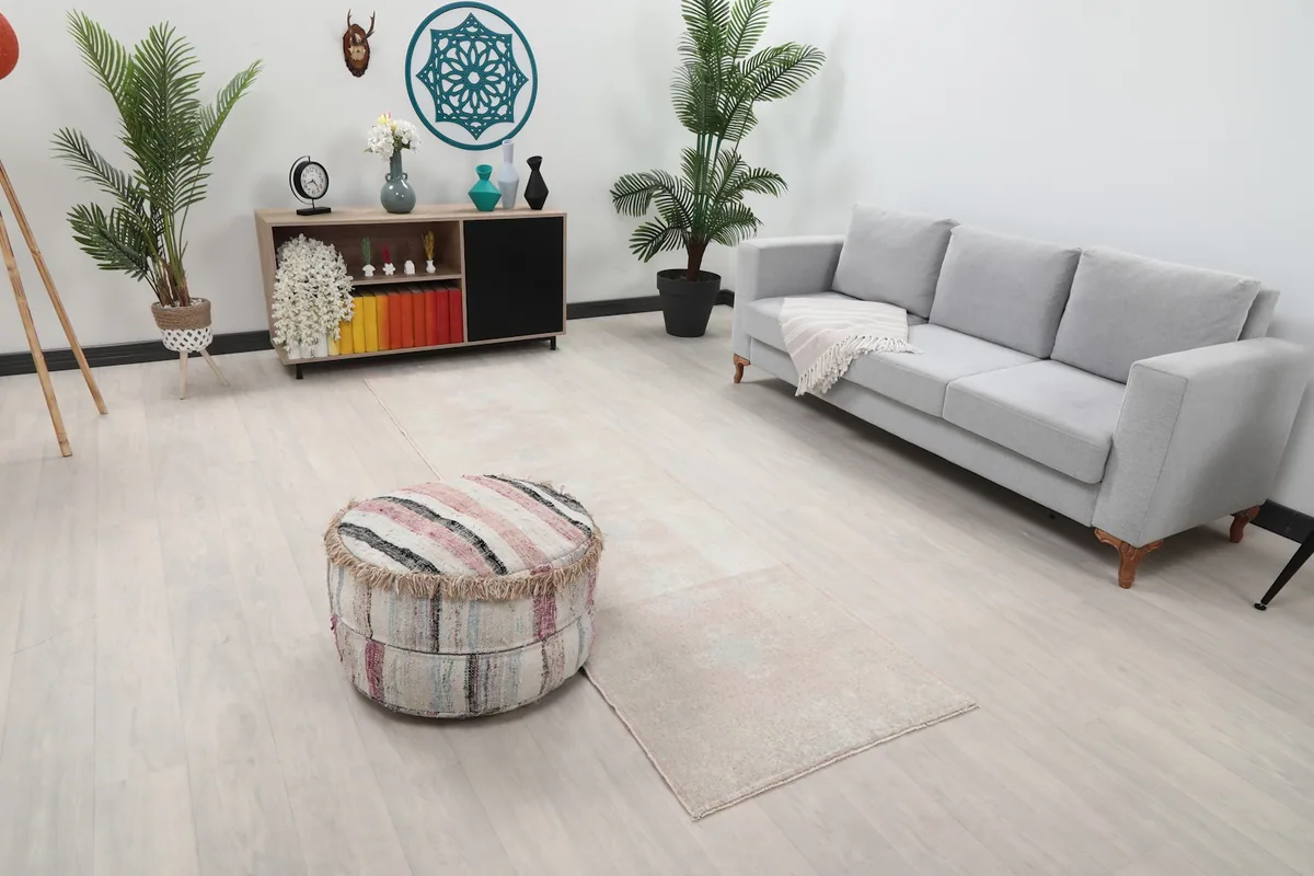 Angle view of the runner rug in a living room, showing its length and integration with decor